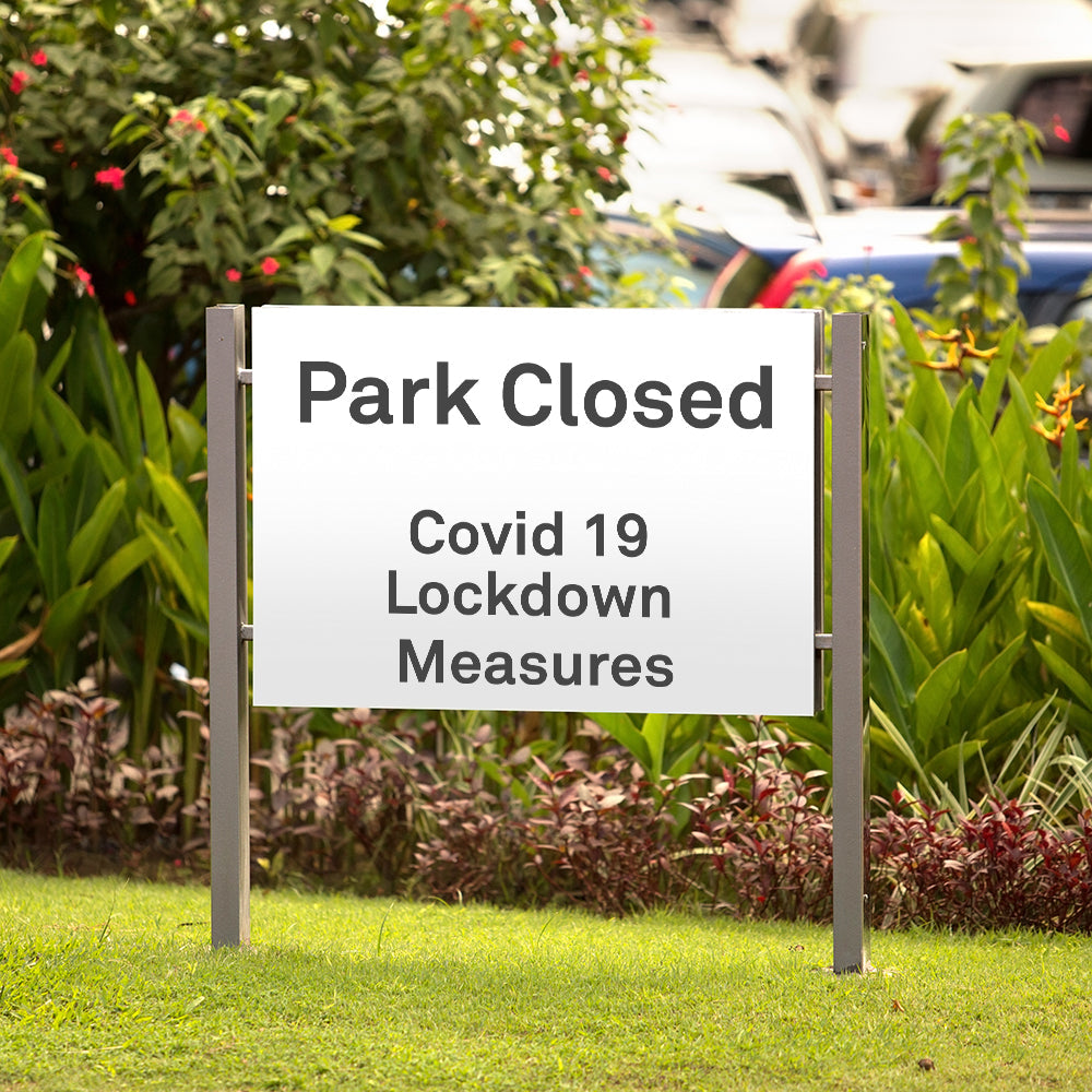 Park Closed sign due to Covid 19 Lockdown Measures in a park setting - aluminium composite panel signs on a metal frame